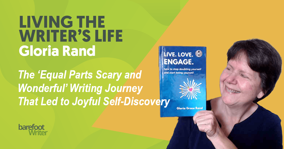 Writer Gloria Rand holding up a copy of her first book